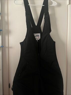 Women’s Snow Bib with Adjustable Straps and zip up front.